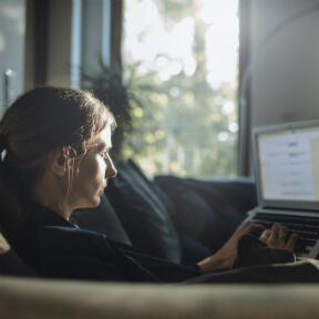 woman looking at life insurance benefit options